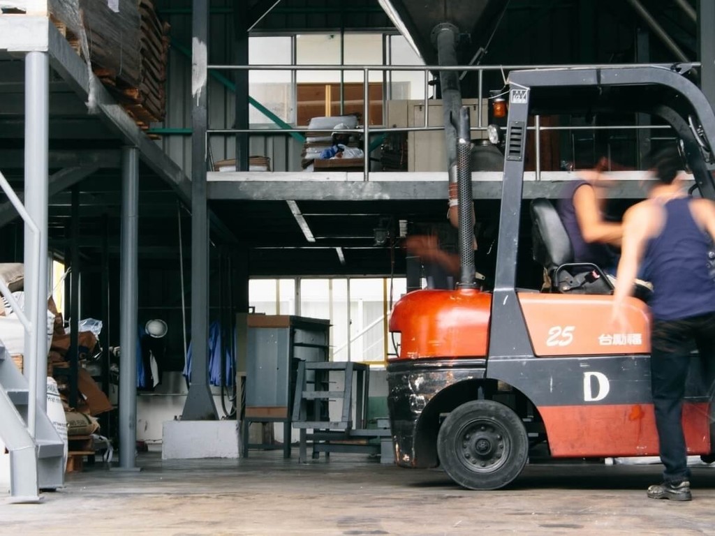 Forklift driver in warehouse environment