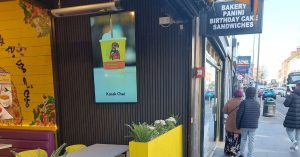 Naan Staap digital signagedisplay from outside