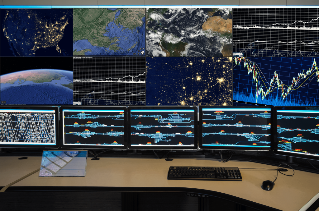 A control room video wall showing a range of data and sources