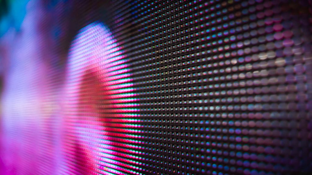 led video wall shows a person in close up with individual pixels