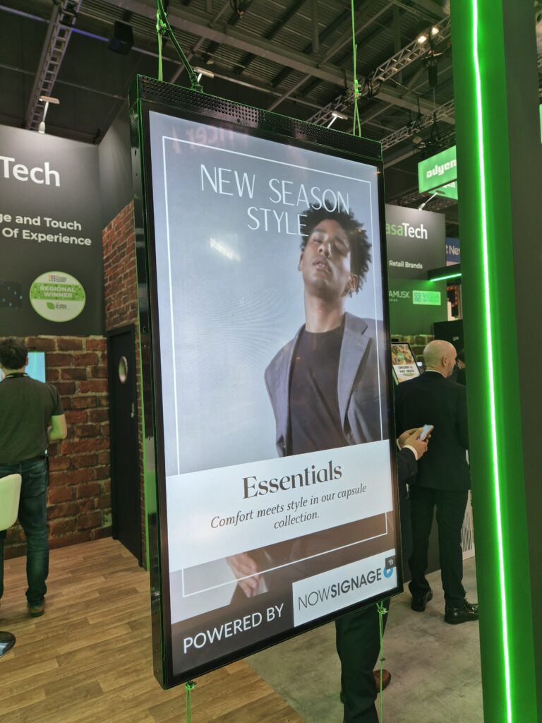 Male fashion ad on a digital signage display.