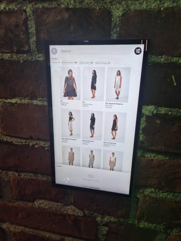 fashion retailers ecommerce store on a digital signage display.